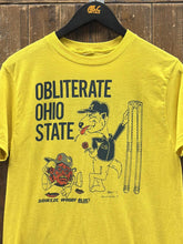 Load image into Gallery viewer, Michigan Wolverines Obliterate Squeeze Woody Blue Vintage 1977 Paper Thin Yellow ABC Vintage 